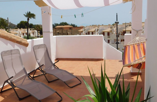 Private roof terrace, A/C, wifi, pool, garage, view, beach at walking distance