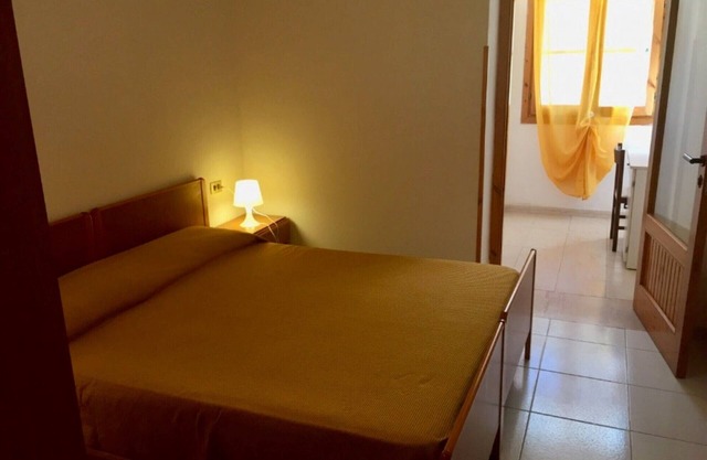 Property in the holiday village 'Baia Falcone - Standard 204' with sea view and air conditioning