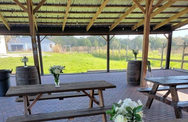 Quaint and Rustic Farm stay with screened in banquet barn.