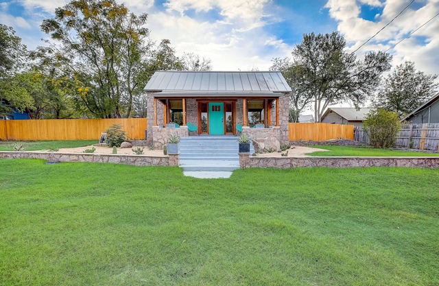 Quaint house with washer/dryer, central AC, patio, & spacious backyard