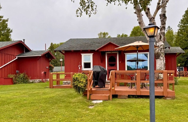 Quaint Lakefront Cabin #2 on Frenchman Lake in Trout Lake, MI with row boat