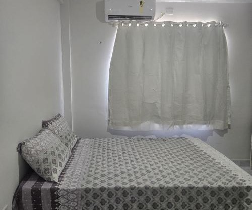 Quarto para dois com ar-condicionado