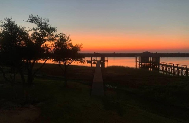 REEL N REST in Hackberry LA ! Waterfront home with beautiful views .