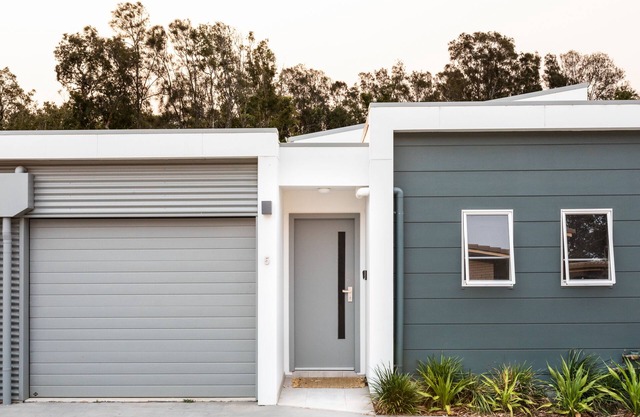 Refresh@Shellys. Boardwalk stroll down to beach from modern coastal villa.