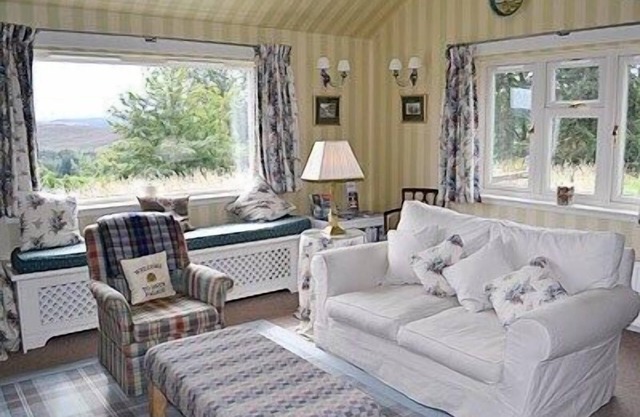 Relax and unwind in this cosy croft house with a woodburner.