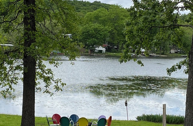 Relax at Grandma’s house with a screened in porch overlooking a private lake!