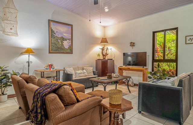 Relaxed tropical home with private pool, lush gardens & family-friendly layout