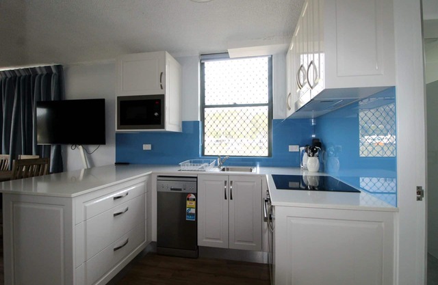RENOVATED, GROUND LEVEL CREEKSIDE BEAUTY!