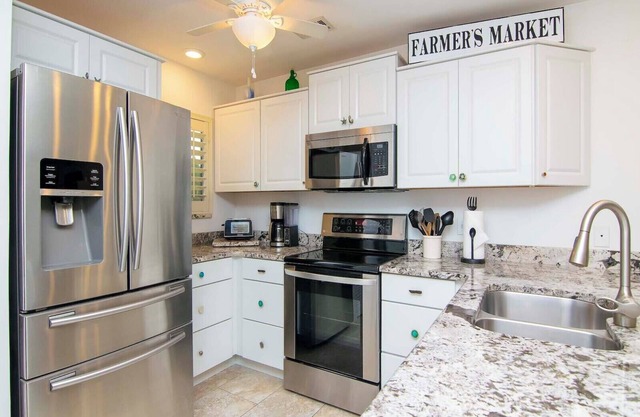 Renovated Saddlebrook 1st Floor 2bd/2ba Condo w/Golf & Water Views