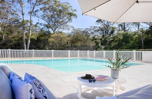 Resort style living with pool, tennis court and beach