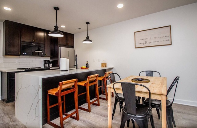 Right across from Bill Snyder Stadium w/parking! Family size condo.