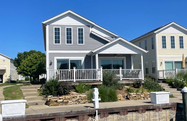 River Front 4-bedroom house with boat dock close to downtown St. Joseph.