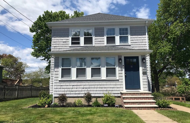 River's Edge: A charming 2BR riverfront home in Gloucester.