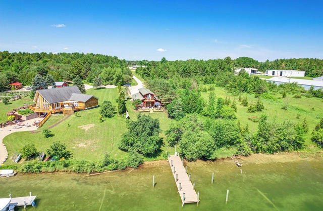 Riverfront Cheboygan Home w/Dock ~ 4 Mi to Town!