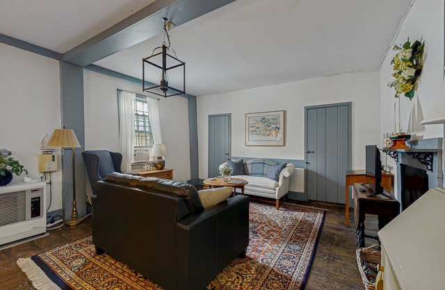 Riverfront condo w/deck overlooking the water - steps to dining & shopping
