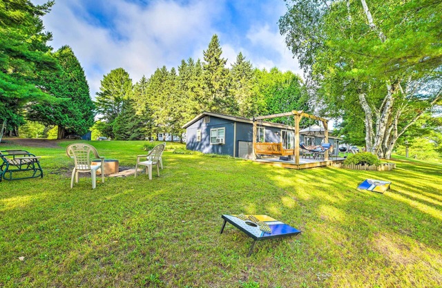 Riverfront Home w/Dock ~ 6 Mi to Cheboygan!
