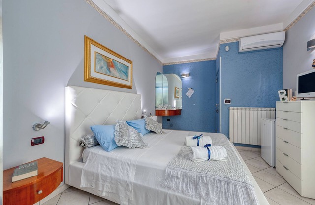 Room 'Il Geco - Blu' with Shared Terrace, Wi-Fi and Air Conditioning