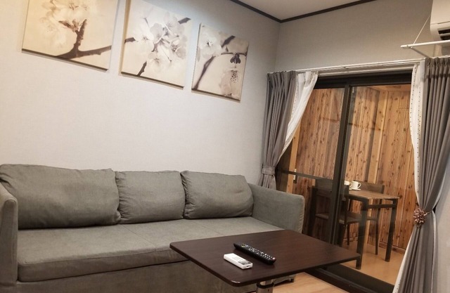 Room on the first floor with a separate Japanesestyle room kitchen and 4 Japanesestyle futons/Kyoto Kyōto