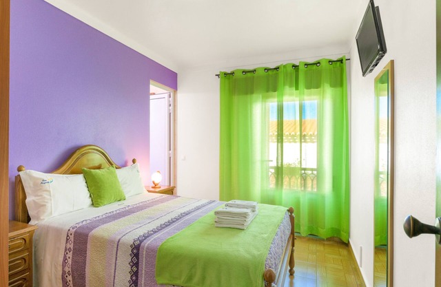 Room 'Quarto Lilás' with Balcony and Wi-Fi