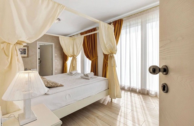 Room 'Relais Olivi Deluxe Venezia' with Lake View, Wi-Fi and Air Conditioning