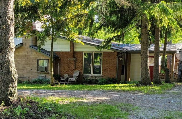 Rustic 2 bedroom home with indoor fireplace.