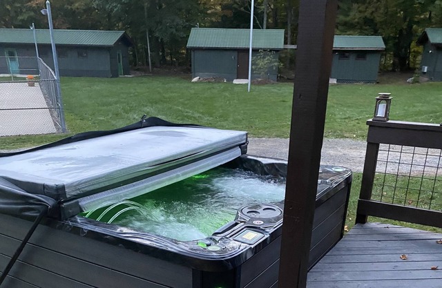 Rustic cabin w hot tub within a new campground! Hiking biking and fishing!