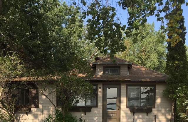 Rustic Lake Front Log Cottage