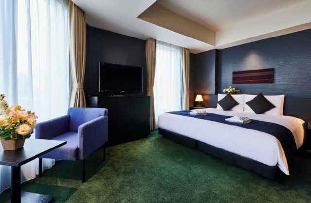 Scenic King hotel with AC, WiFi in vibrant Taito City