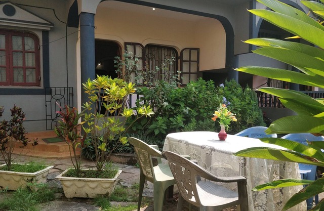 Semi-Service apartment cum row house 2 minutes from the beach with kitchen.