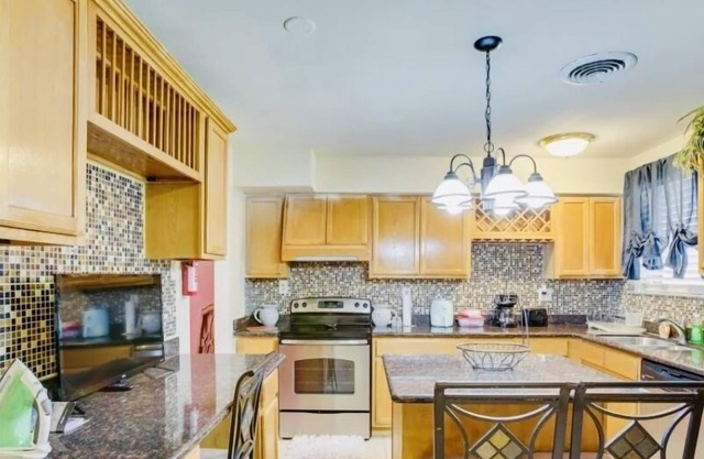 Smoke free Beautiful home close to down town, bus route with off street parking.