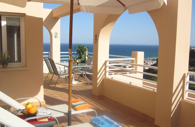 South facing apartment - spectacular sea & mountain views with communal pool.