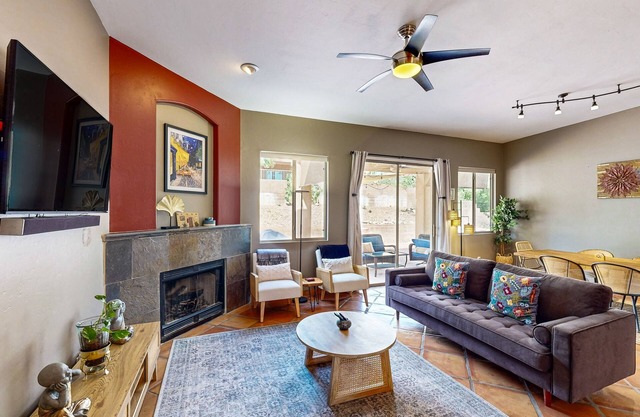 Southwestern home with hot tub, large yard, grill, & gas fireplace