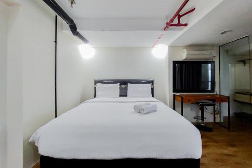 Spacious 2BR Loft at Brooklyn Alam Sutera Apartment By Travelio