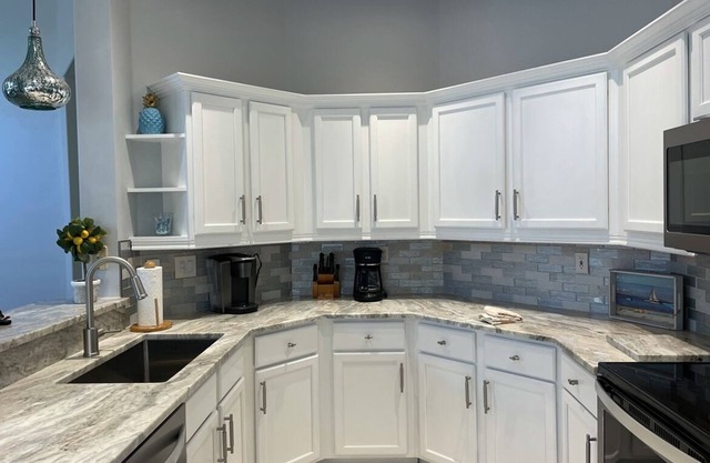 Spacious 3 BR, 2 bath condo in Gated Golf Community, private pool, near beaches.