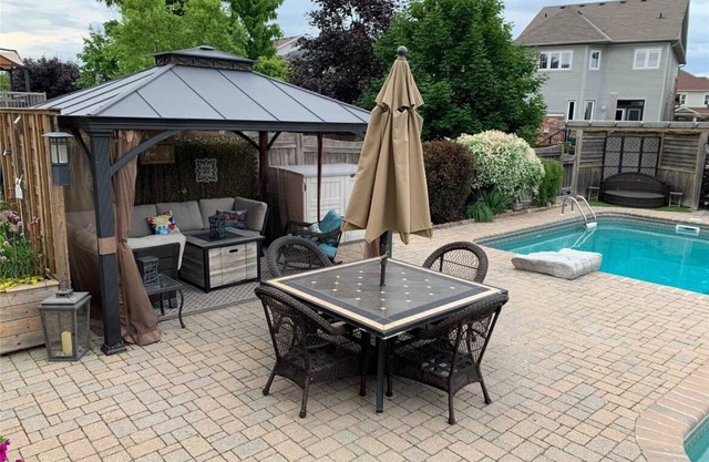 Spacious 5-bedroom house w charming lake view with WiFi, AC, saltwater pool