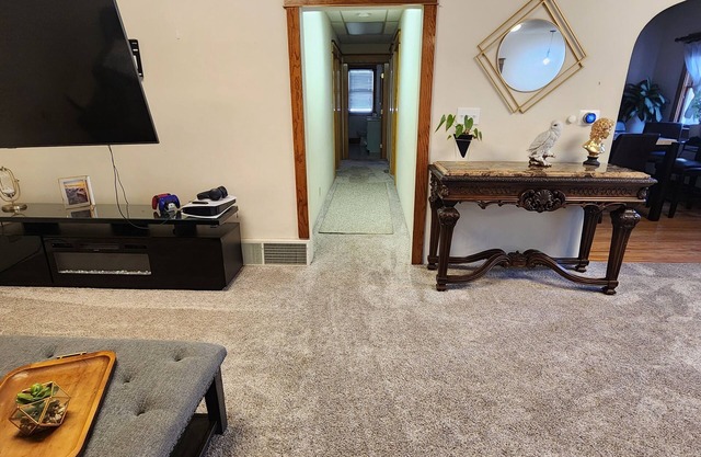 Spacious home in downtown Scottsbluff with hot tub and large backyard deck.