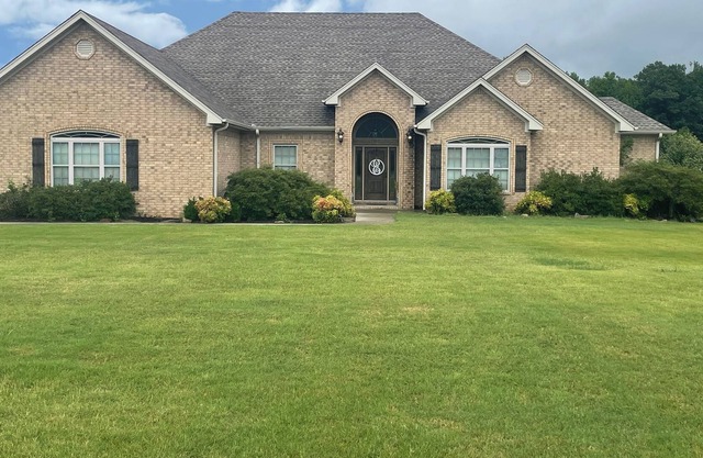 Spacious house perfect for entertaining with pool located on local golf course.
