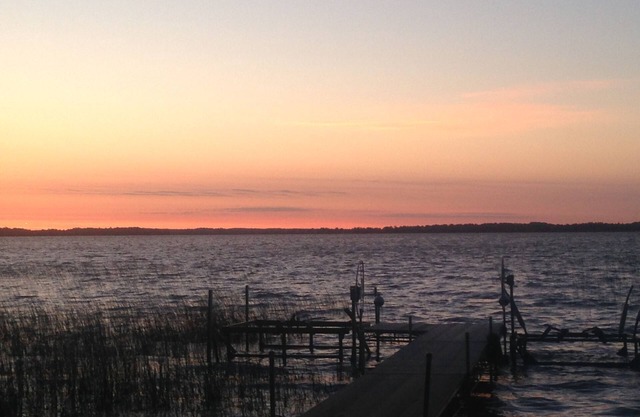 Spectacular sunrise glistening off the lake from this quiet lakeside retreat
