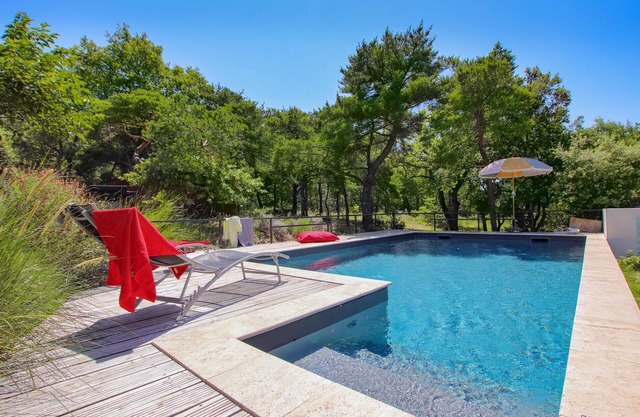 Spend a dream vacation in this delightful modern cottage style home with pool.