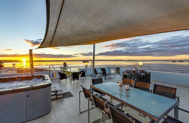 Spiral staircase to 2 level rooftop Penthouse with Hot spa & BBQS
