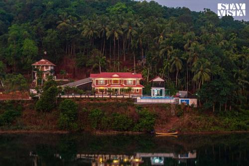 StayVista at Lagoons Villa with Lawn, Pool, WiFi