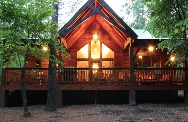 Step inside to see the lush décor and cathedral ceiling. Pool Table, Hot Tub!