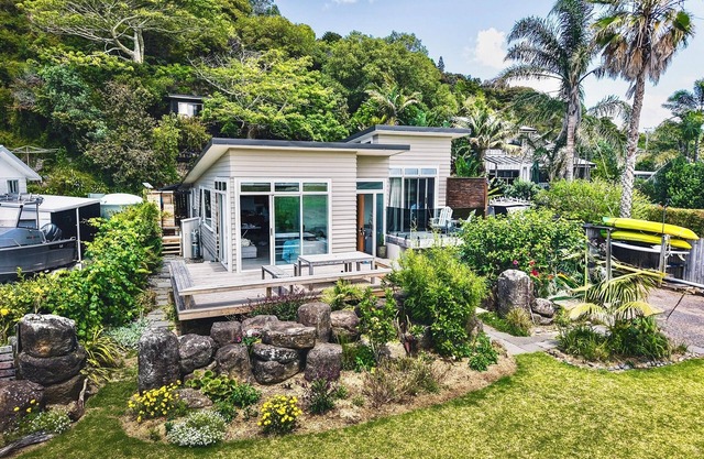 Steps to the beach, ocean views, boat launching and kayaks included!