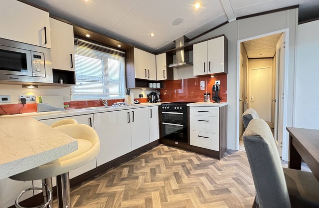 Stewarts Resort Lodge 32 - a lodge that sleeps 6 guests in 3 bedrooms