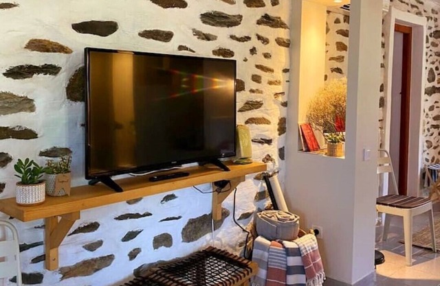 Stone cottage with yard