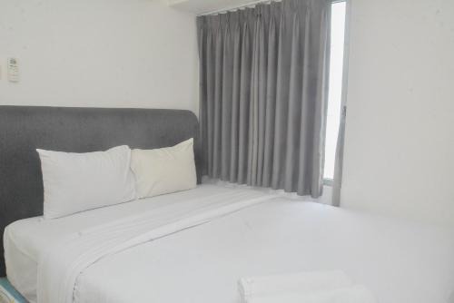 Strategic and Minimalist 2BR at Bassura City Apartment By Travelio