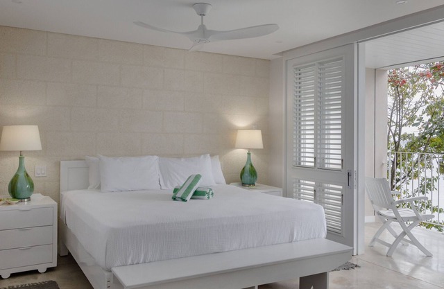 Stunning 3BR beachfront property, w/private steps to the beach