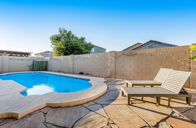 Stunning home with pool, patio, grill, central AC & washer/dryer