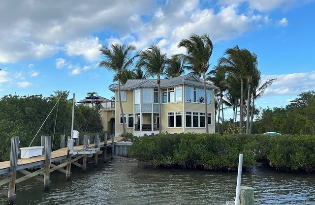 Stunning Riverfront Home with Private Beach and Close to the Ocean.