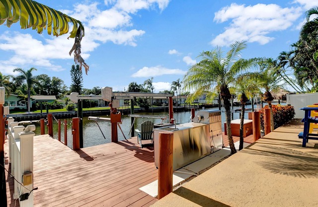 Stunning Waterfront home | Heated Pool | Private Dock | Minutes to Beaches